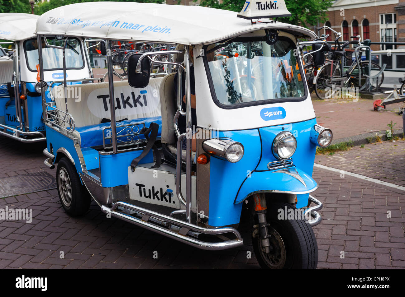 Trois roues taxi dans les rues d'Amsterdam, Pays-Bas Banque D'Images