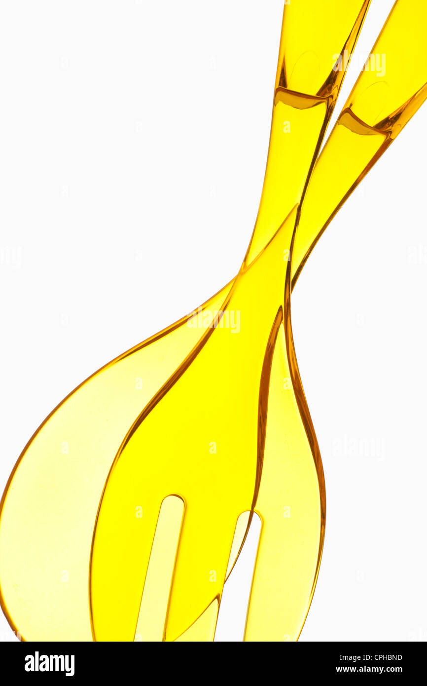 Outils de cuisine faite de plastique jaune Banque D'Images