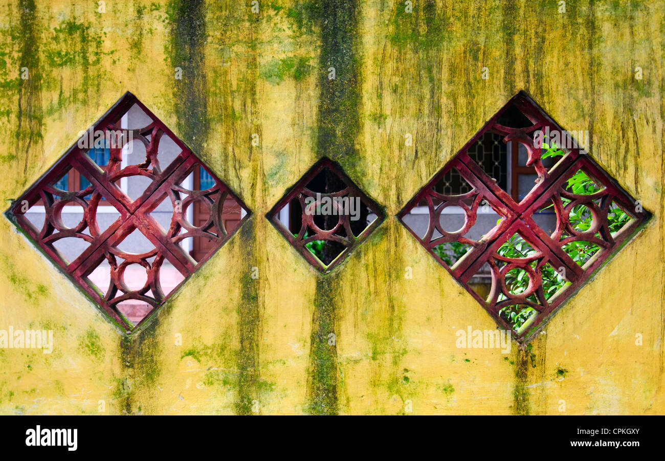 Détails extérieurs de Hoi An au Vietnam. Les maisons jaunes dans Hoi An sont une partie du patrimoine mondial de l'Unesco. Banque D'Images