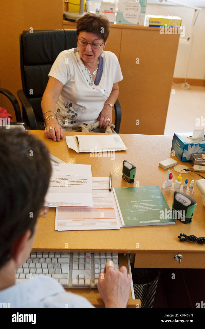 Femme EN CONSULTATION Banque D'Images