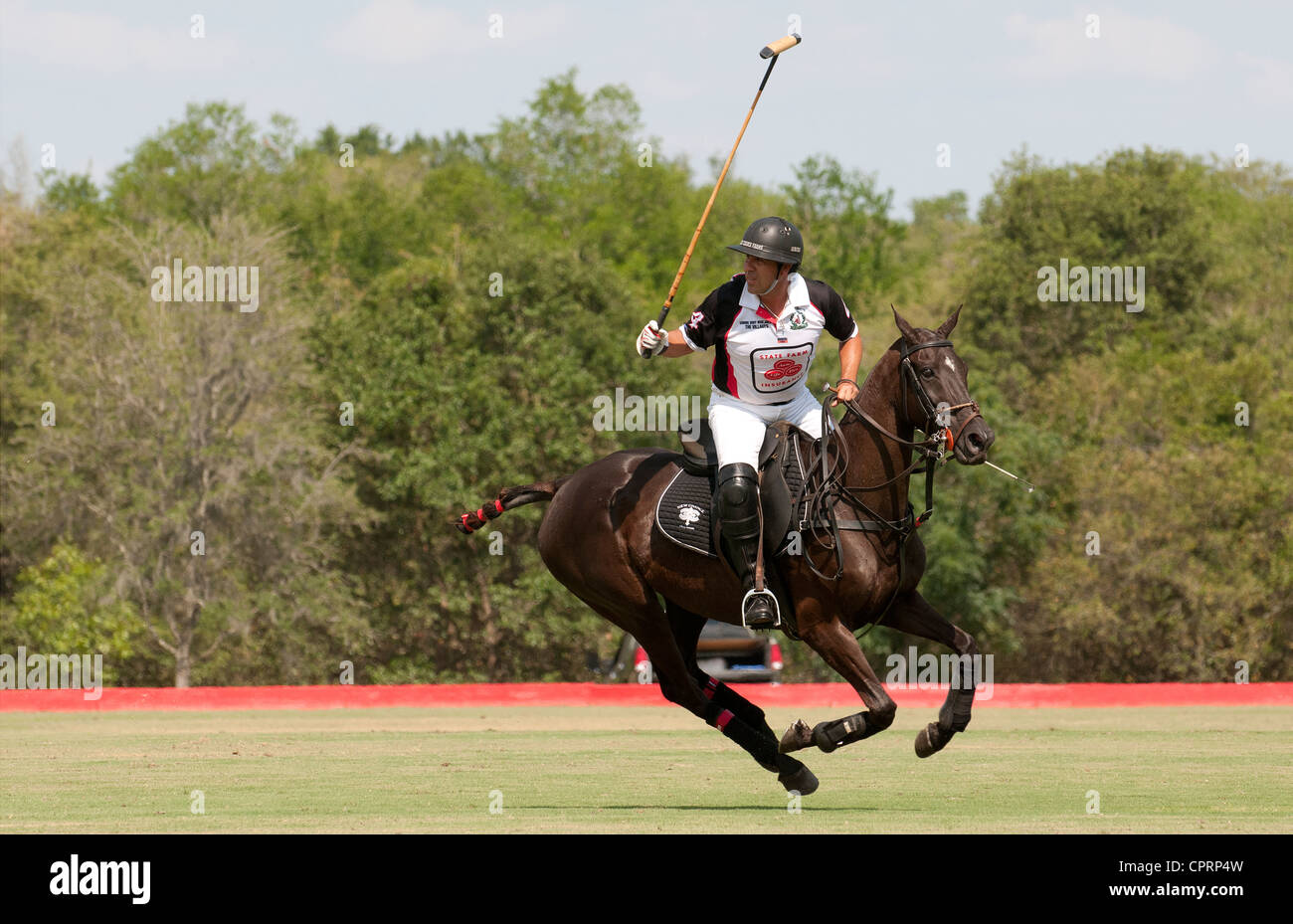 Polo player Cuko Escapite en action dans les villages Polo Club dans le centre de la Floride USA Banque D'Images