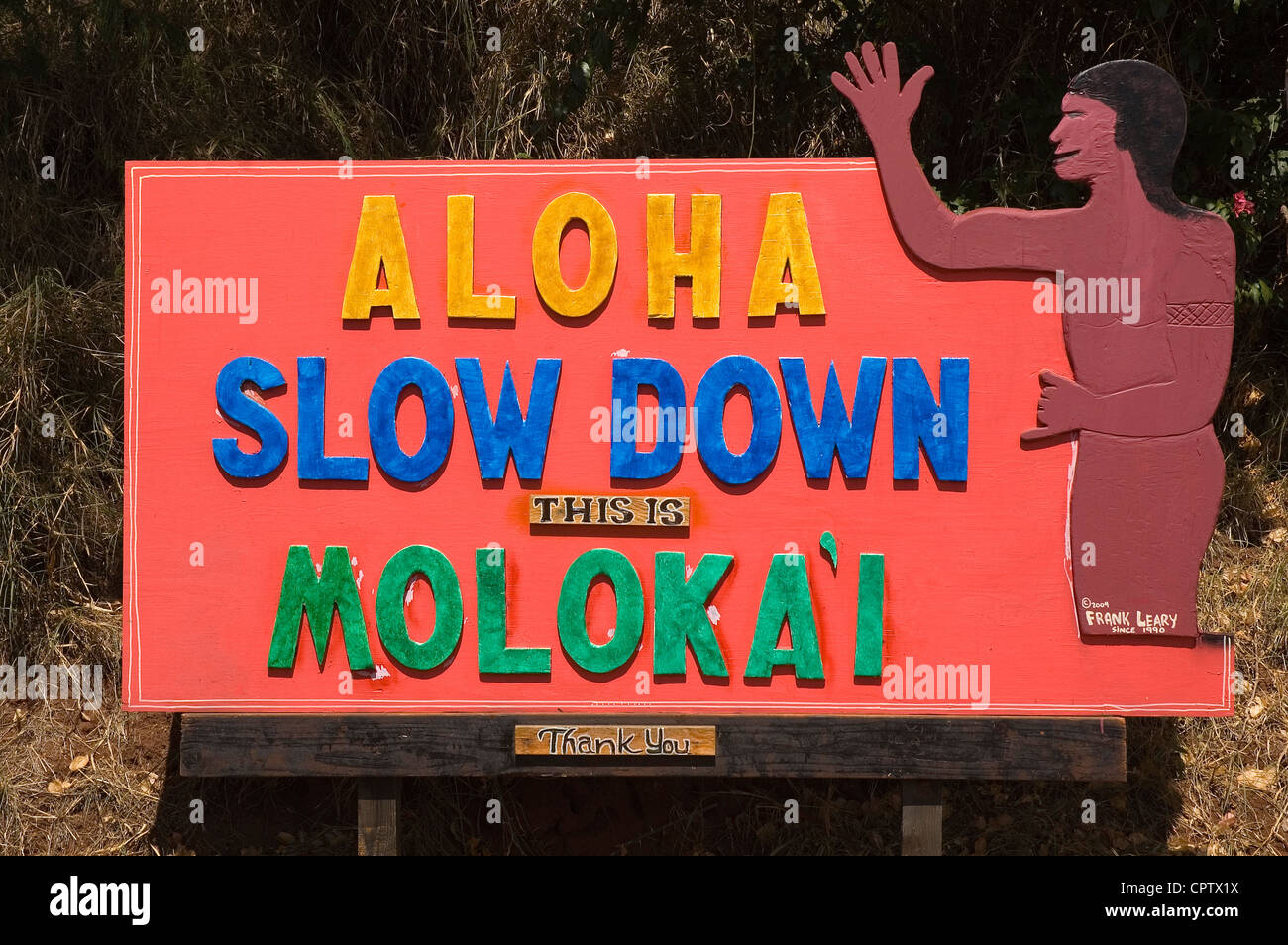 Elk284-6230, Molokai, Hawaï Aloha Ralentir sign Banque D'Images