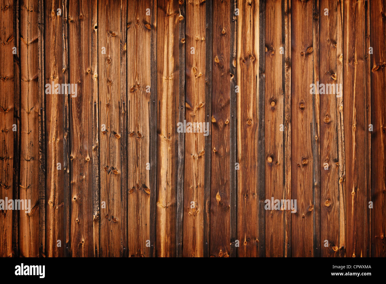 Une clôture faite de vieilles planches de mélèze - grunge background Banque D'Images