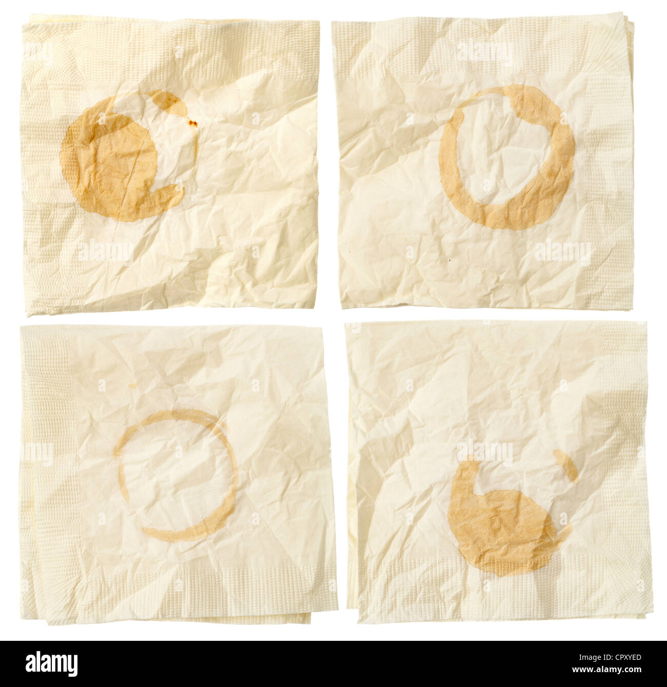 Quatre serviettes de papier froissé avec des taches de café isolated on white Banque D'Images