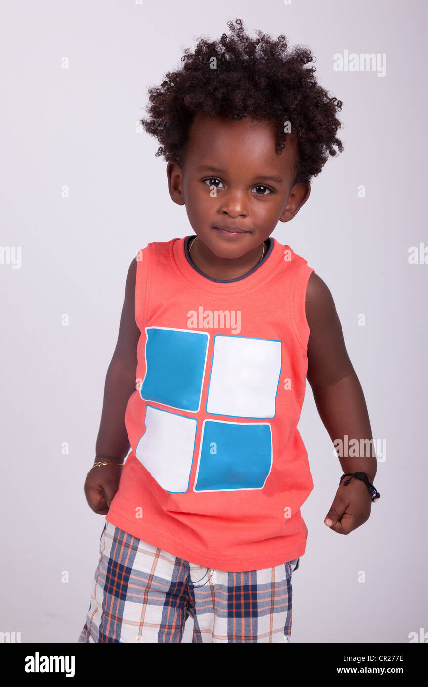 Portrait Of A Cute Baby Boy Noir Isole Sur Fond Gris Photo Stock Alamy