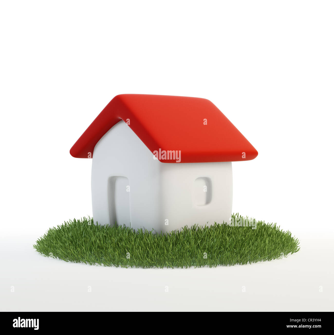Green building concept - petite caricature accueil sur un patch d'herbe Banque D'Images
