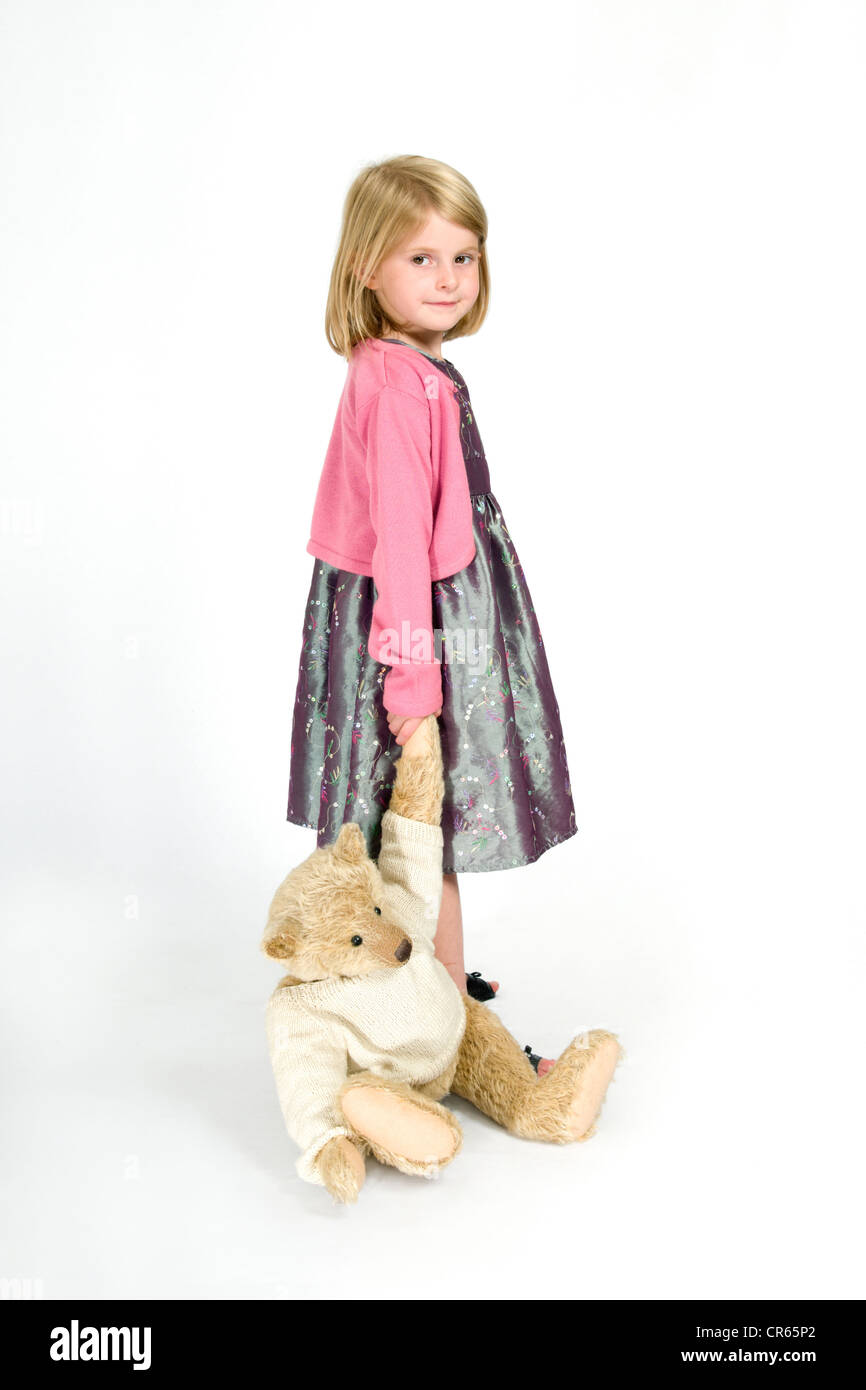 Studio image d'un happy woman 7 ans, fille d'ours sur un fond blanc Banque D'Images