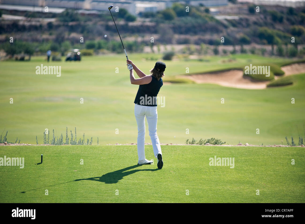 Chypre, woman on golf course Banque D'Images