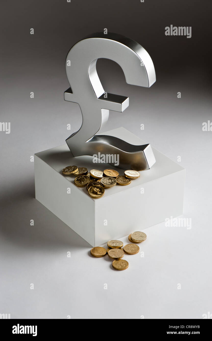 Symbole de la livre sterling et des pièces Banque D'Images