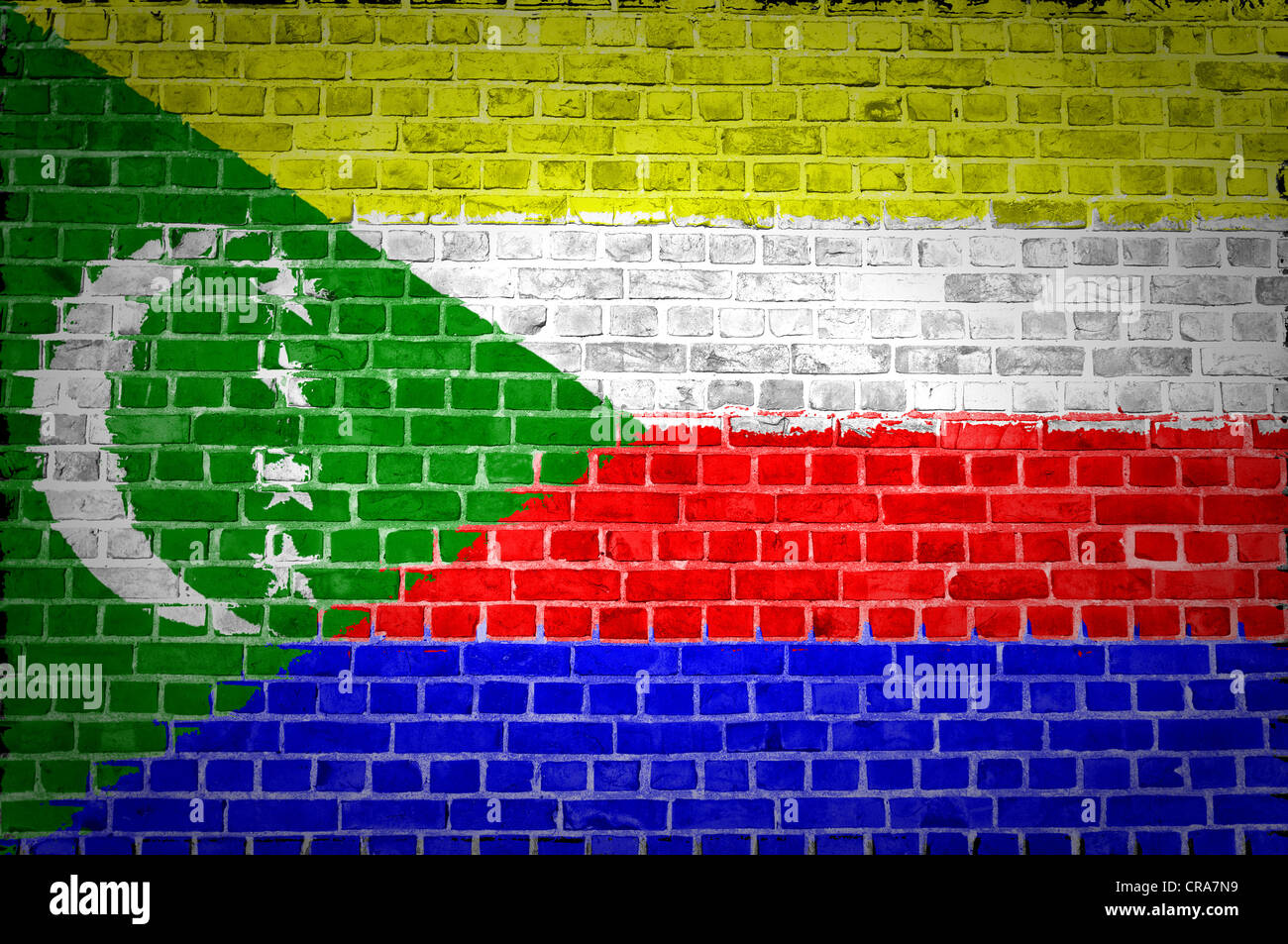 Une image des Comores drapeau peint sur un mur de briques dans une localisation urbaine Banque D'Images