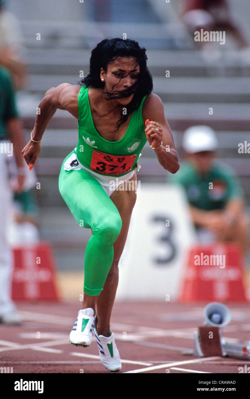 Florence Griffith Joyner en compétition aux 1988 Jeux Olympiques nous suivre et les essais sur le terrain Banque D'Images