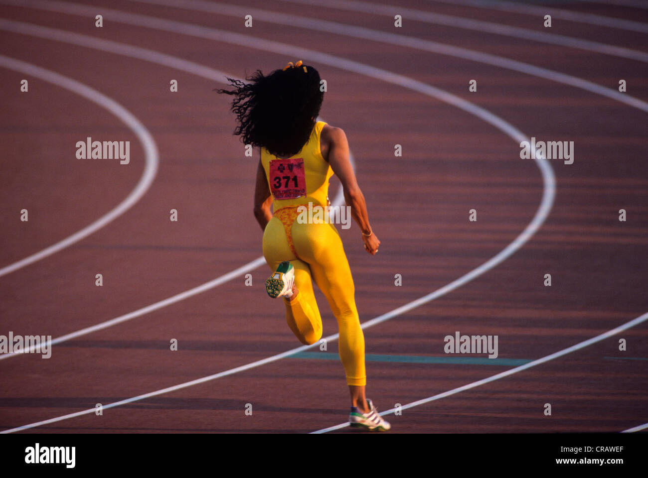 Florence Griffith Joyner en compétition aux 1988 Jeux Olympiques nous suivre et les essais sur le terrain Banque D'Images