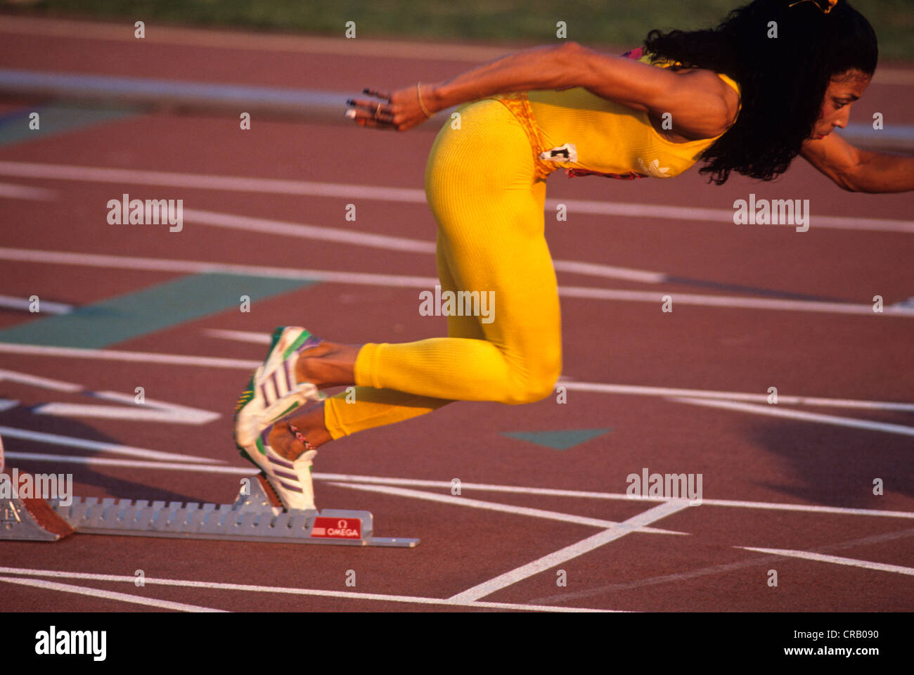 Florence Griffith Joyner en compétition aux 1988 Jeux Olympiques nous suivre et les essais sur le terrain Banque D'Images