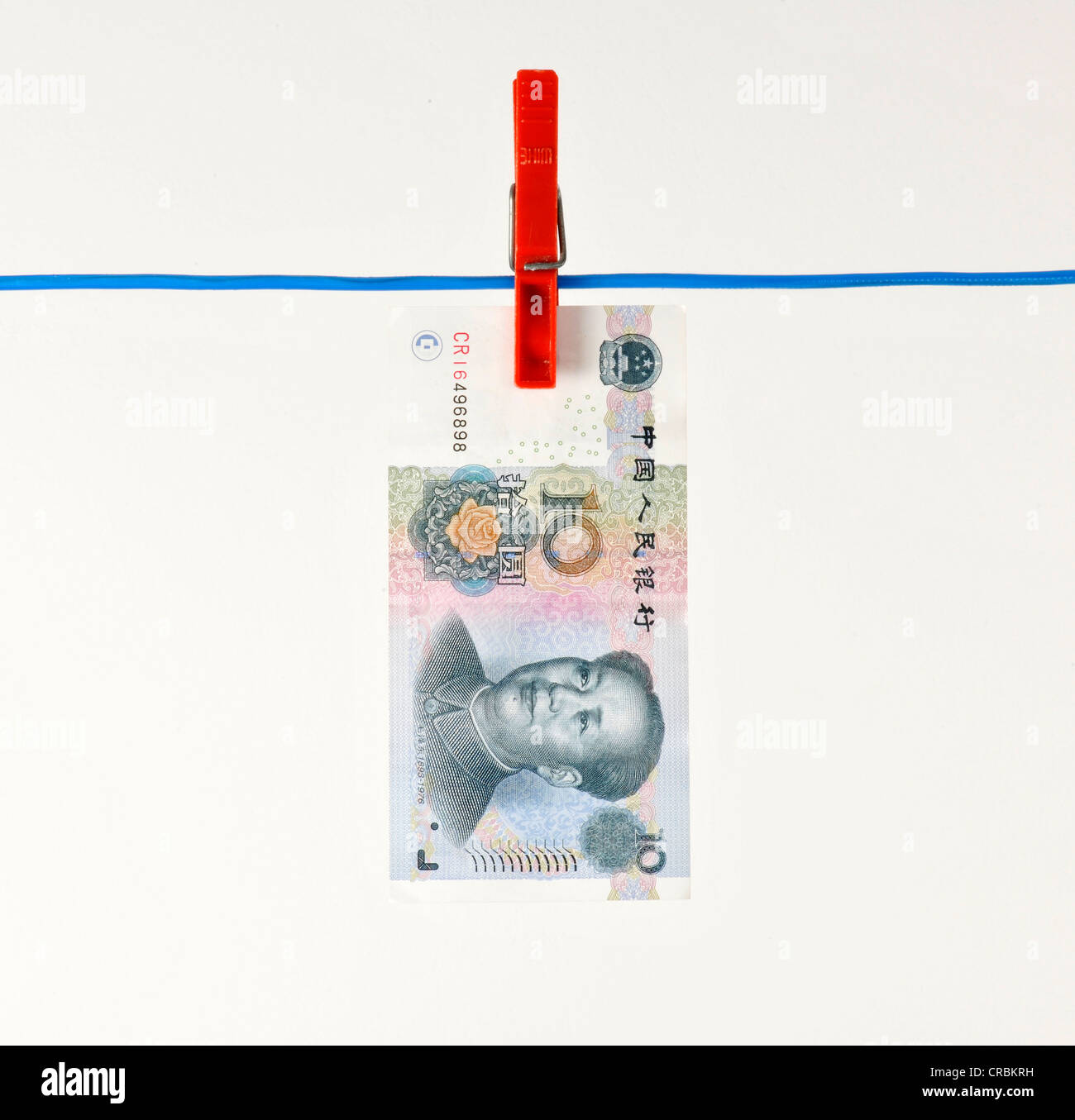 Yuan chinois Yuán, Renminbi, monnaie, de la République populaire de Chine, banque remarque sur une corde, image symbolique pour l'argent Banque D'Images