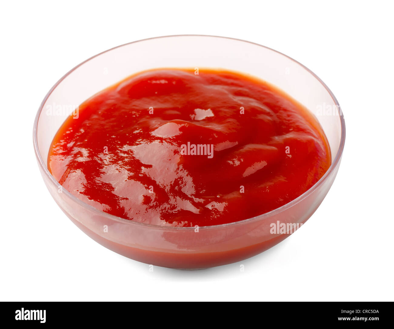 Tasse de sauce ketchup isolated on white Banque D'Images