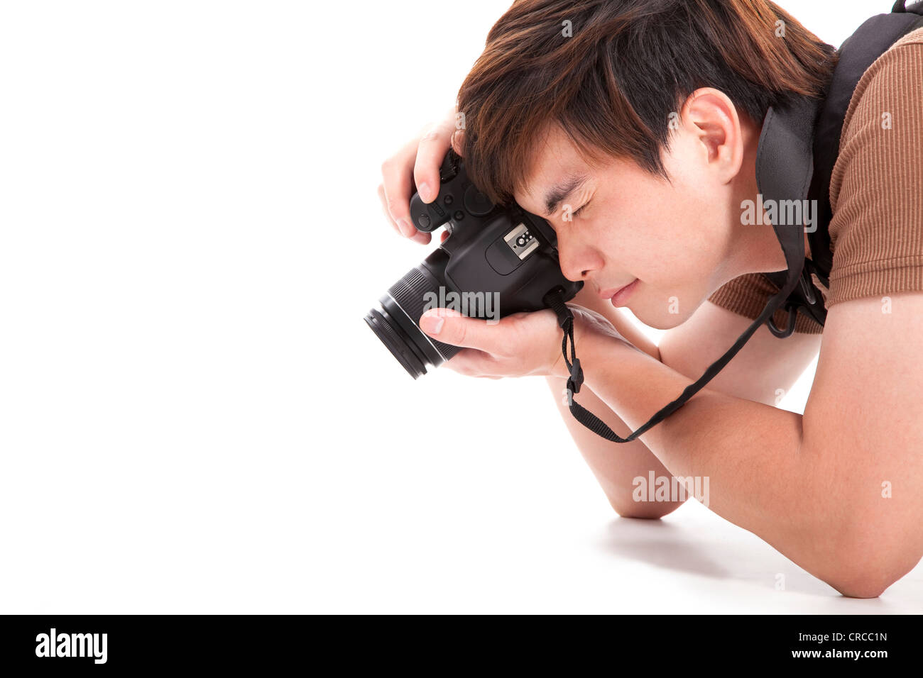 Jeune homme avec caméra photo Banque D'Images