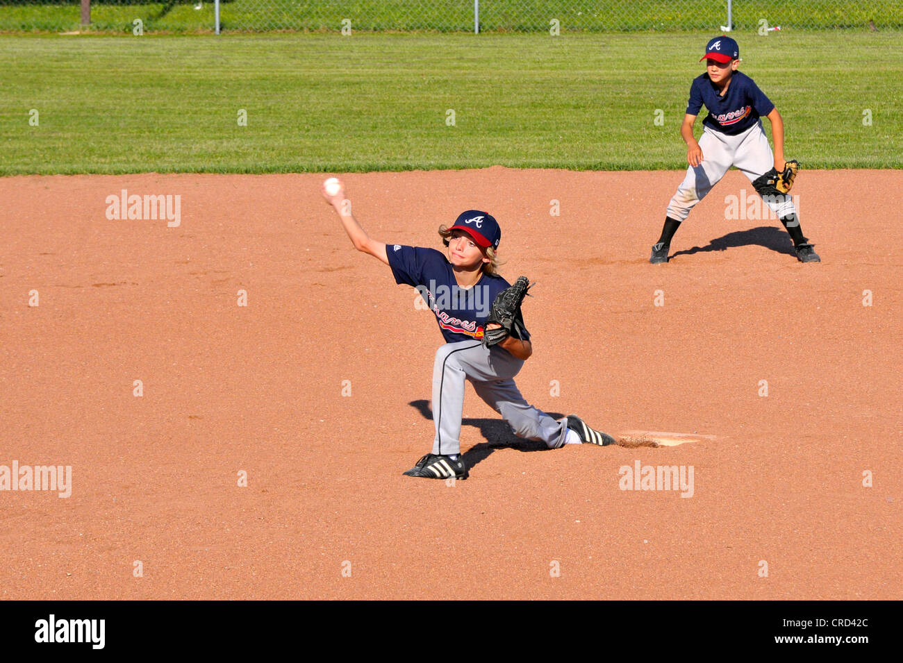 La petite ligue de baseball baseball pitcher lancer Banque D'Images