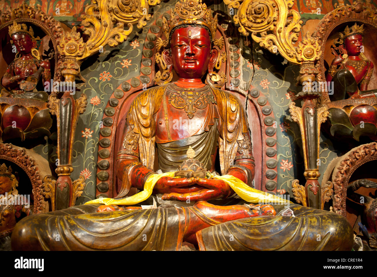 Le bouddhisme tibétain, de style Newari sculptures, statues peintes de couleurs vives fait de bois et d'argile rouge, statue de Bouddha, Palcho Banque D'Images