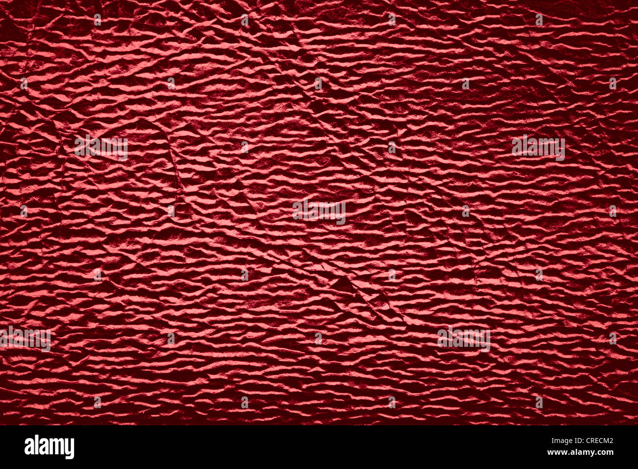 Fond en cuir rouge avec des réflexes de lumière blanche Banque D'Images