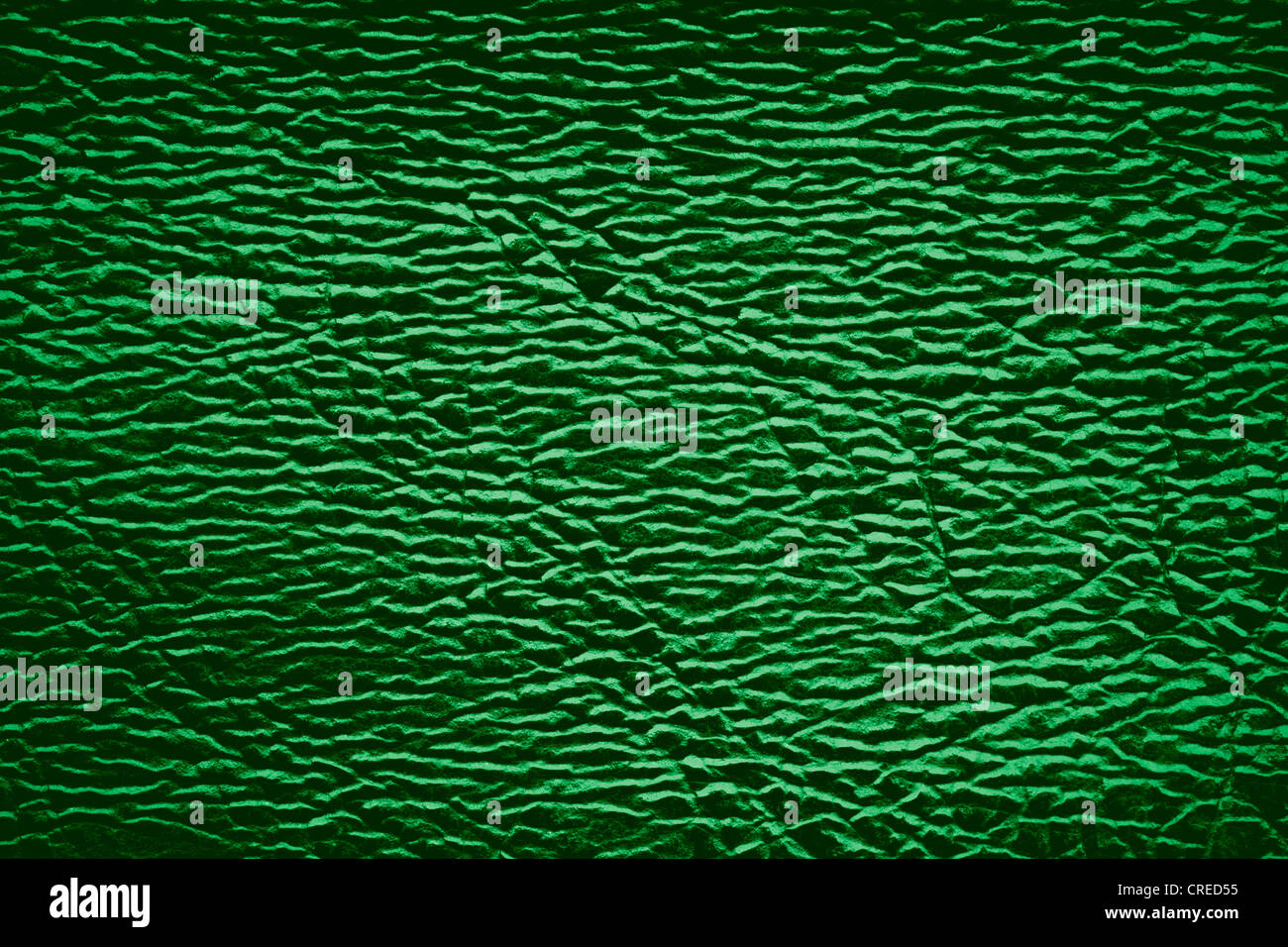 Fond en cuir vert avec des réflexes de lumière blanche Banque D'Images