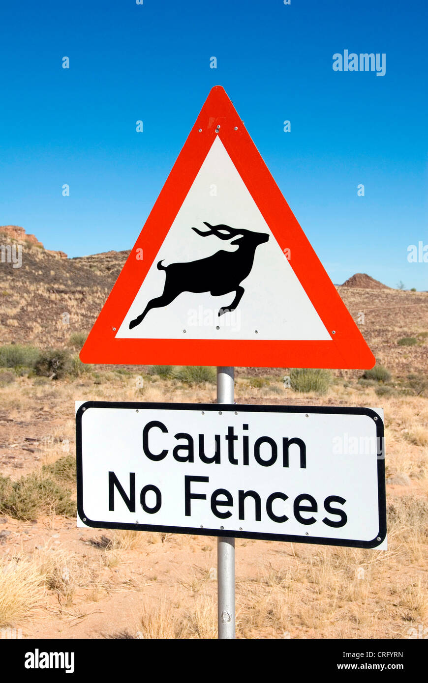 Panneau de circulation, attention deer pass, pas de clôture, la Namibie Banque D'Images