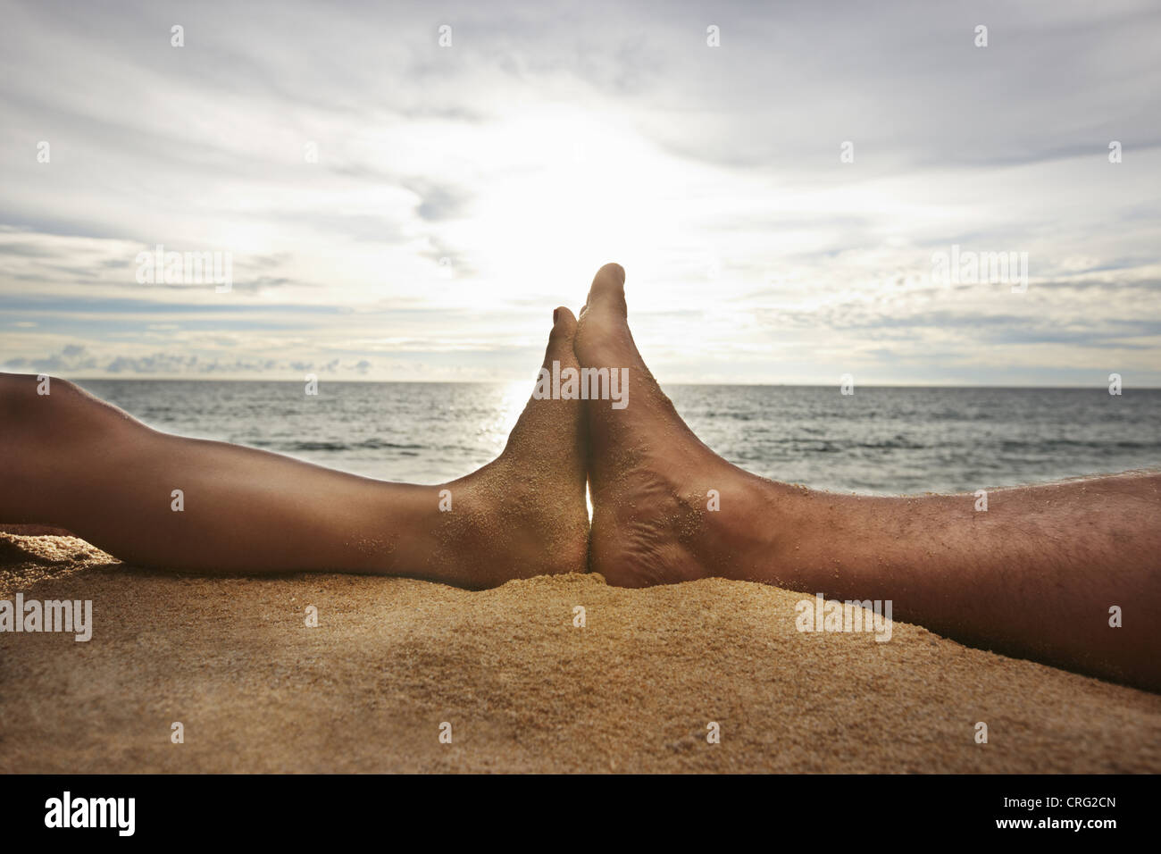 Close up of pieds touchant on beach Banque D'Images