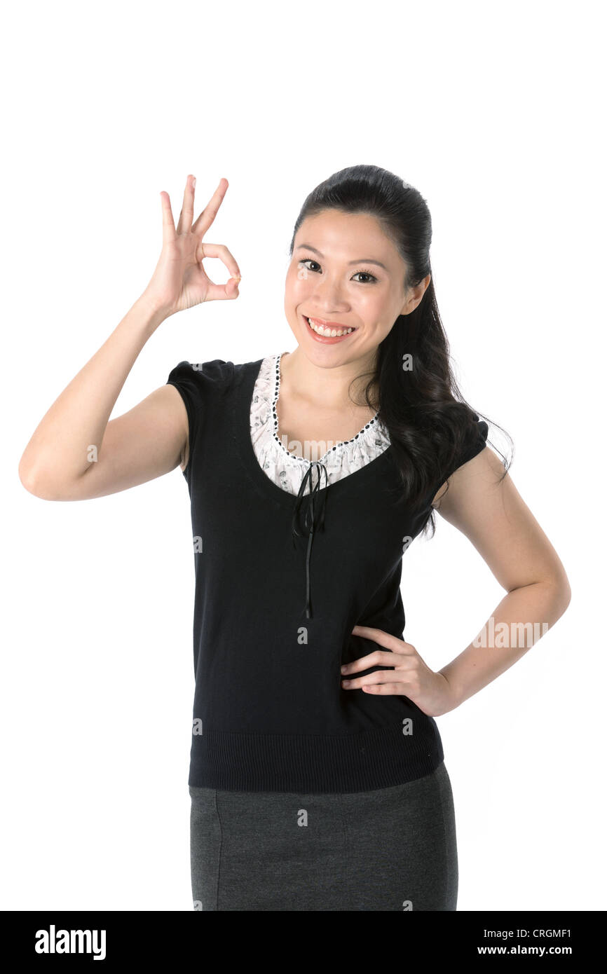 Femme Asiatique faisant symbole OK avec sa main. Banque D'Images
