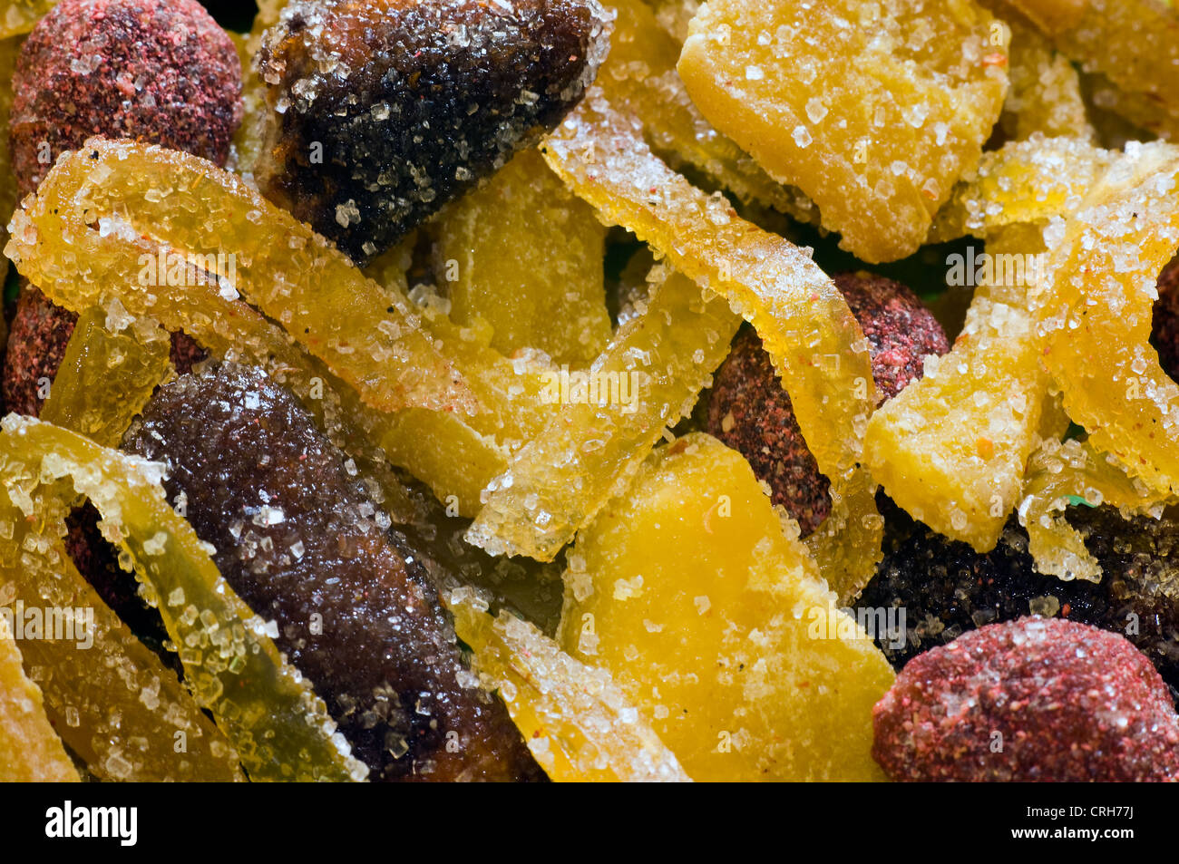 Séché et divers fruits enrobés de sucre en studio Banque D'Images