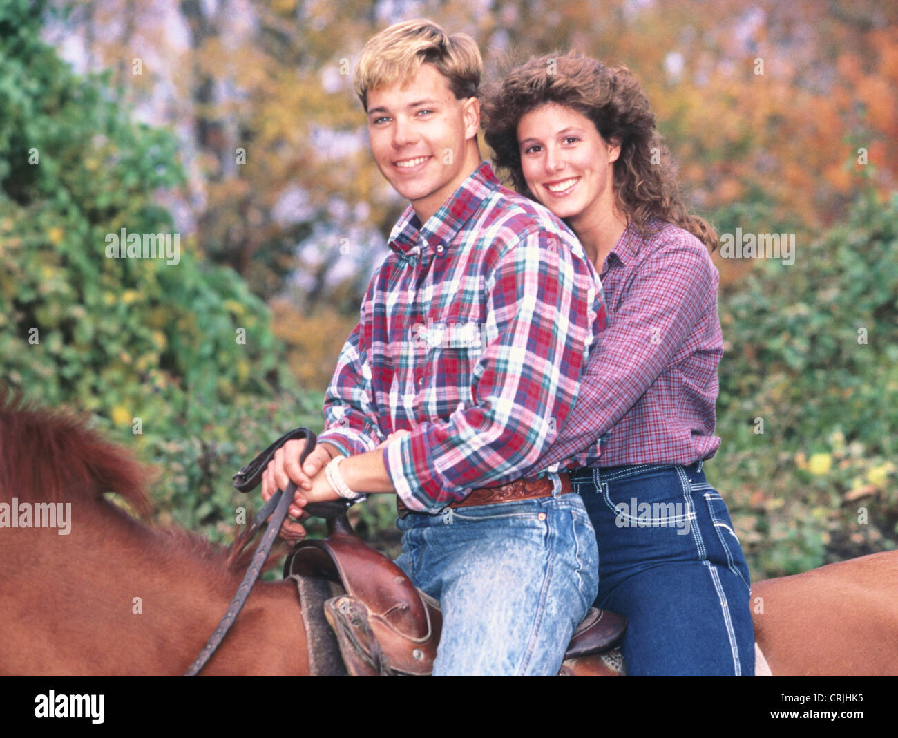 Vintage portrait d'un couple à cheval Banque D'Images