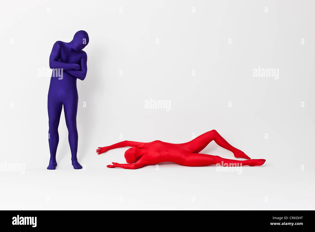 Couple in bodysuits posing together Banque D'Images
