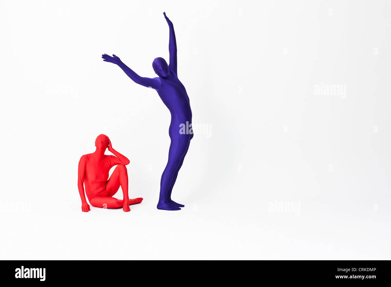 Couple in bodysuits posing together Banque D'Images