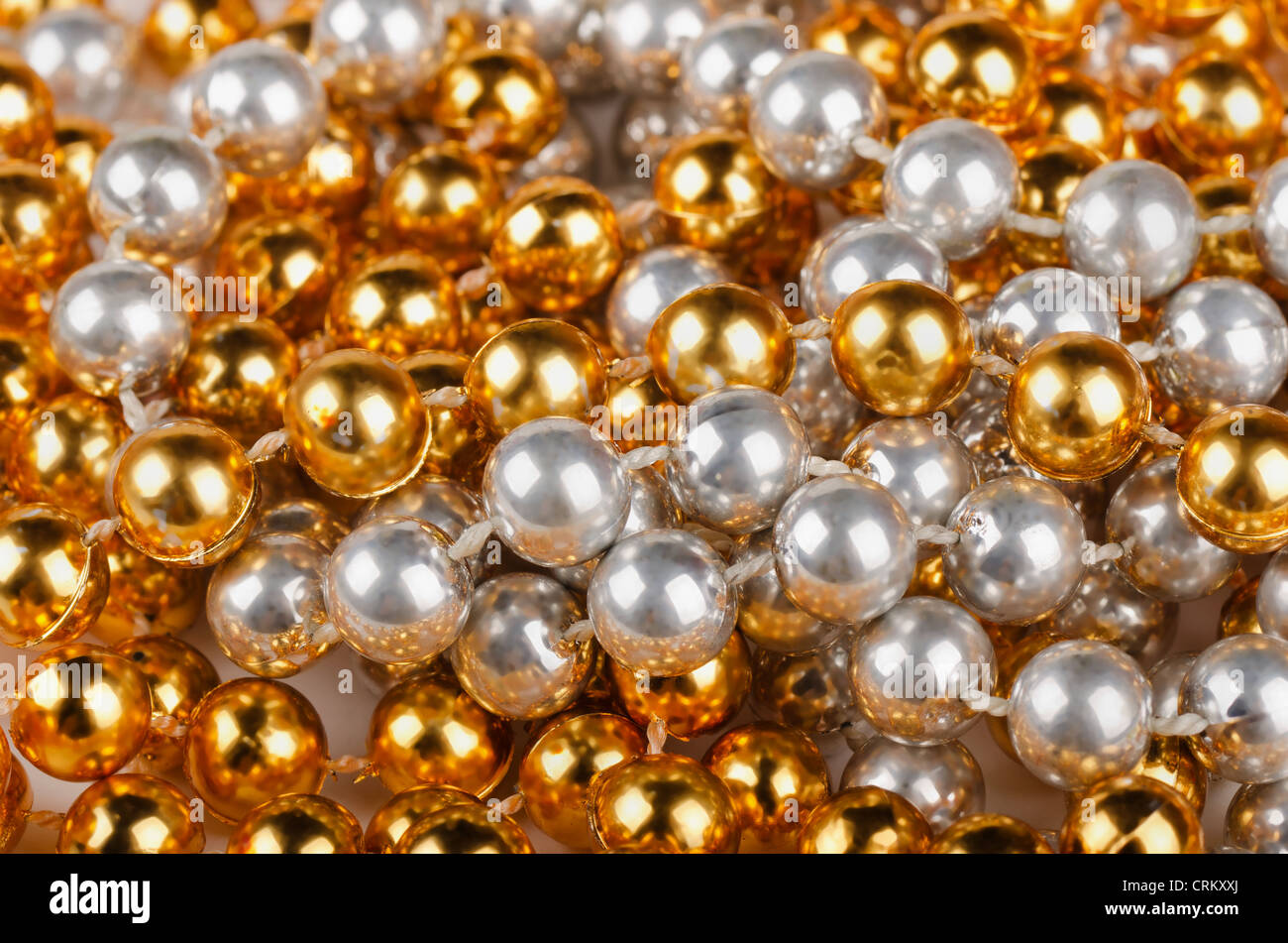 Fond d'or et d'argent perles de Noël Banque D'Images