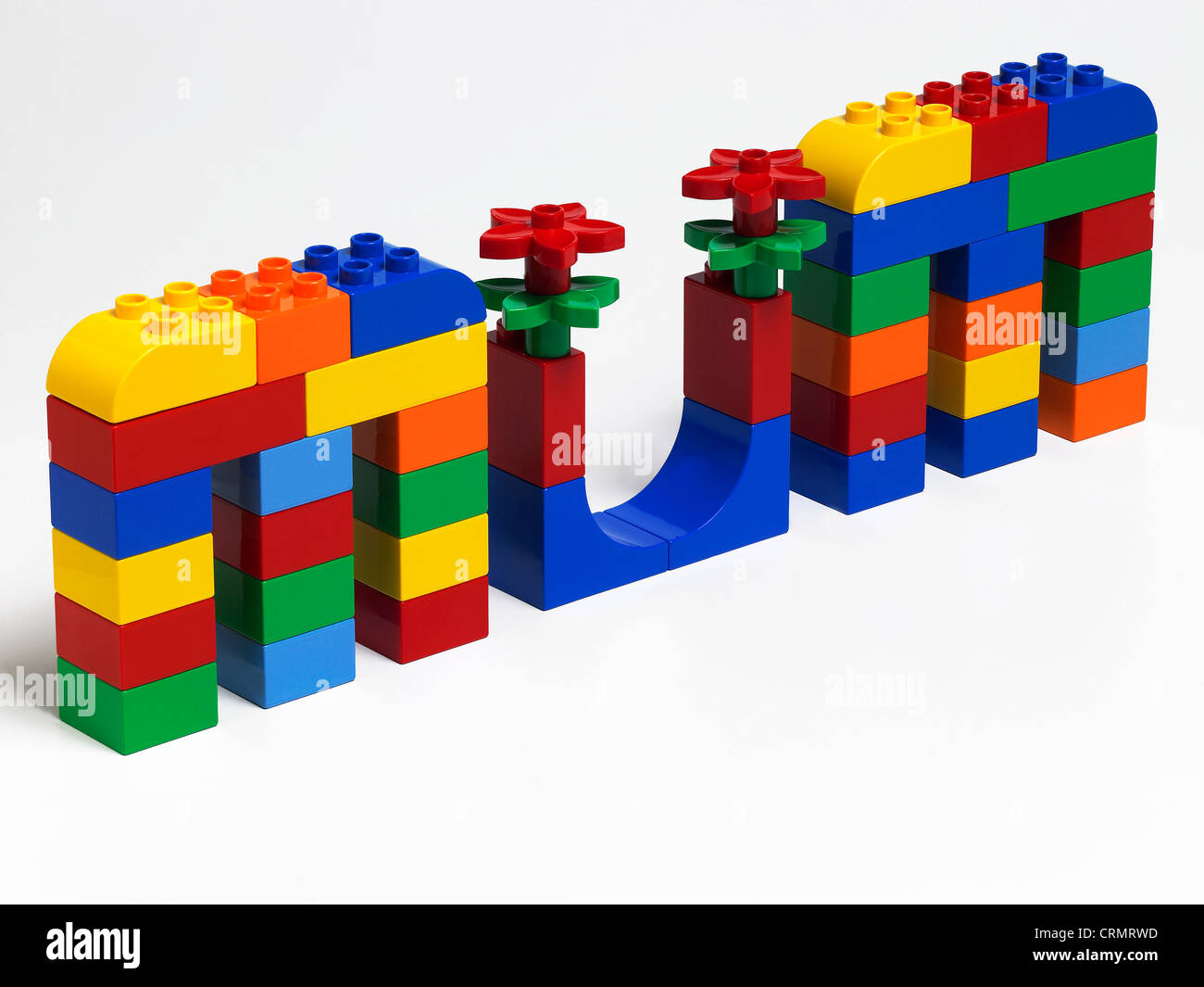 Briques de construction en plastique de couleur l'orthographe du mot maman Banque D'Images