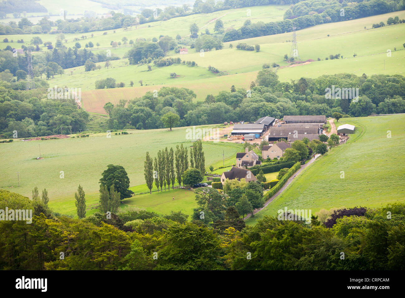 Une ferme de Cleeve Hill près de Cheltenham dans les Cotswolds, Gloucestershire, Royaume-Uni. Banque D'Images