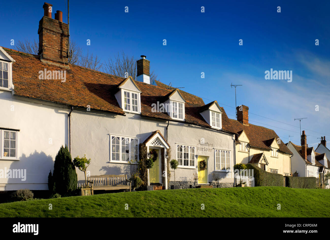 Une rangée de cottages dans le joli village de Finchingfield décrit comme "le village le plus photographié en Angleterre". Banque D'Images