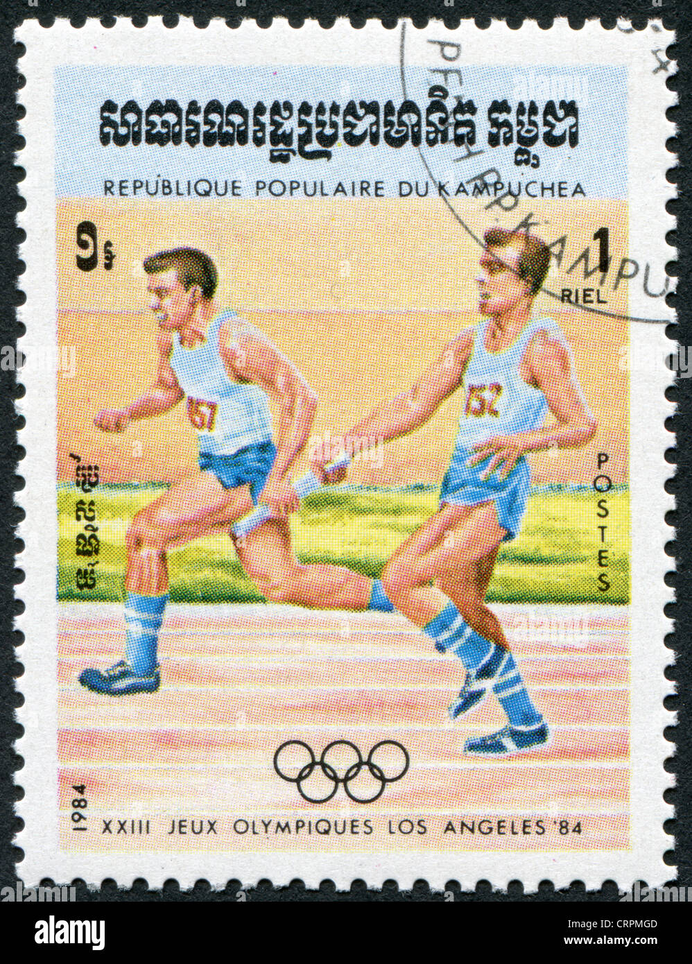 Un timbre imprimé dans le Kampuchea, est dédié au Jeux Olympiques d'été de 1920 à Los Angeles, course de relais, circa 1984 Banque D'Images