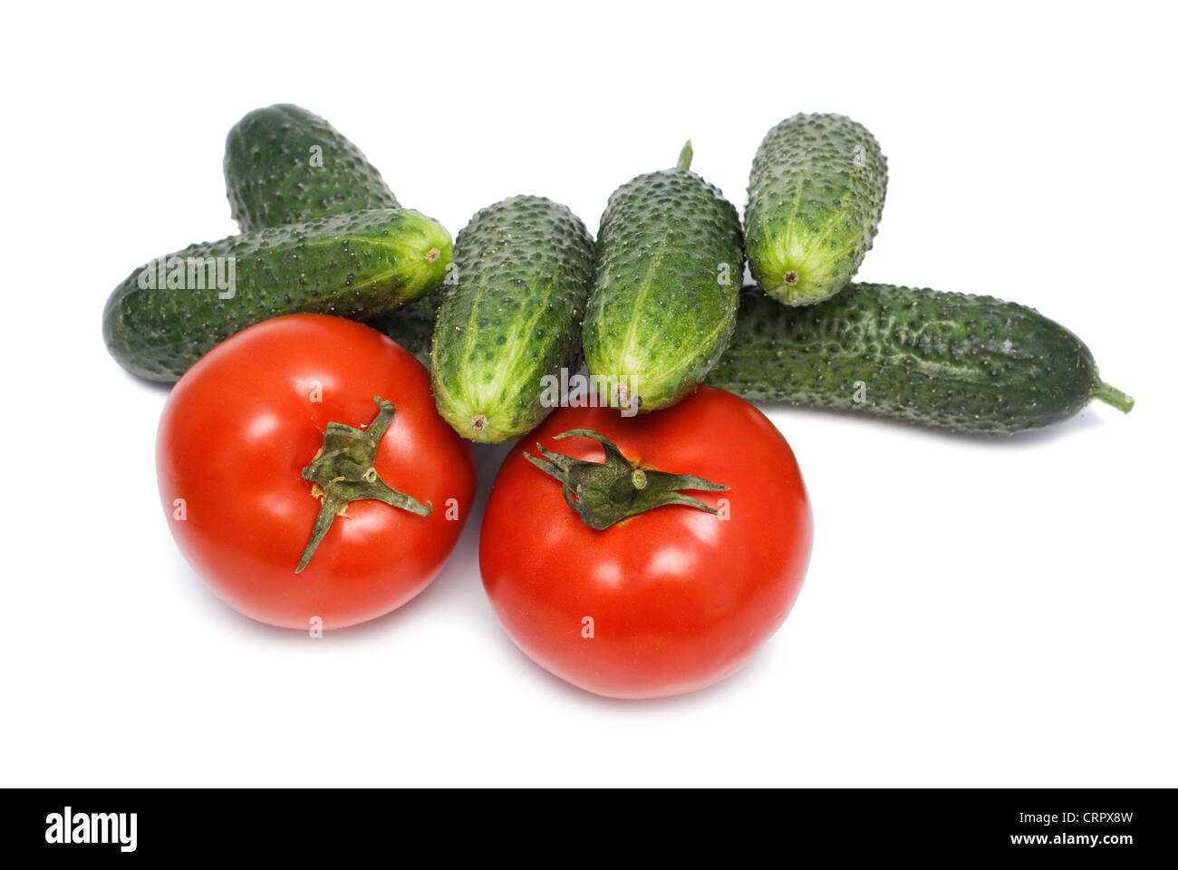 Tomates et concombres isolated on white Banque D'Images