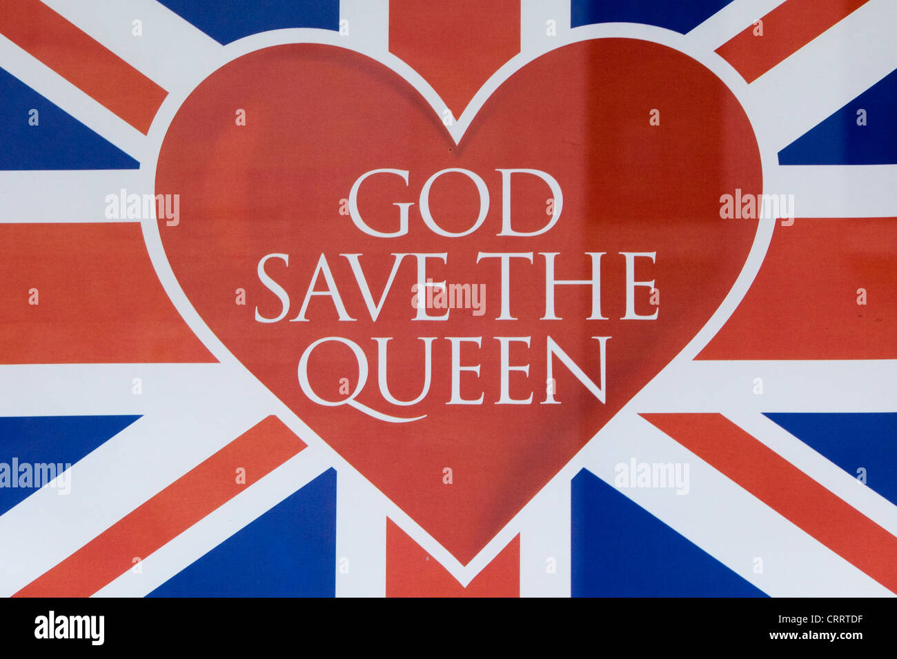 Union Jack Flag avec Dieu sauve la reine sur elle Banque D'Images