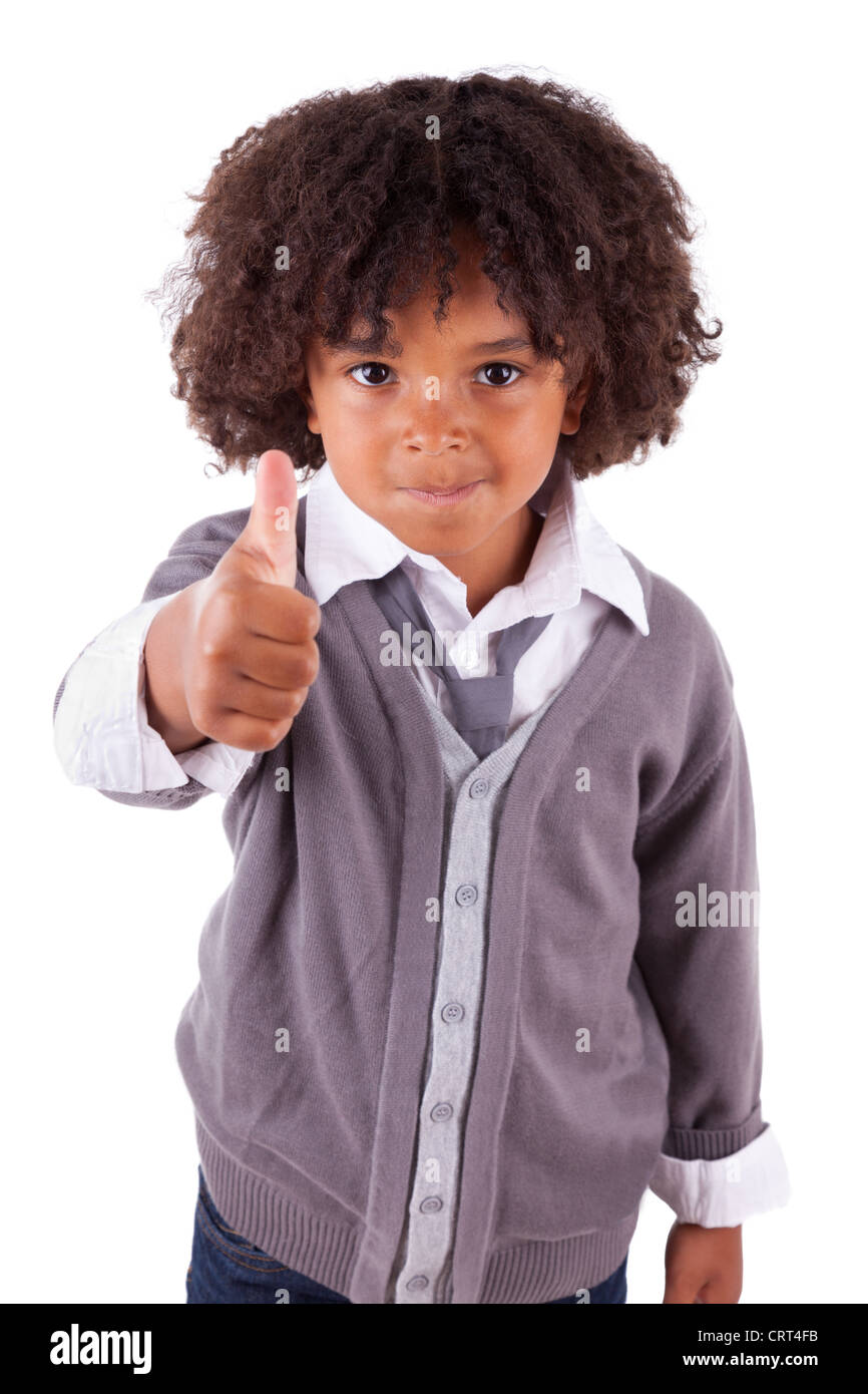 Portrait of a cute little boy making africains Thumbs up,isolé sur fond blanc Banque D'Images