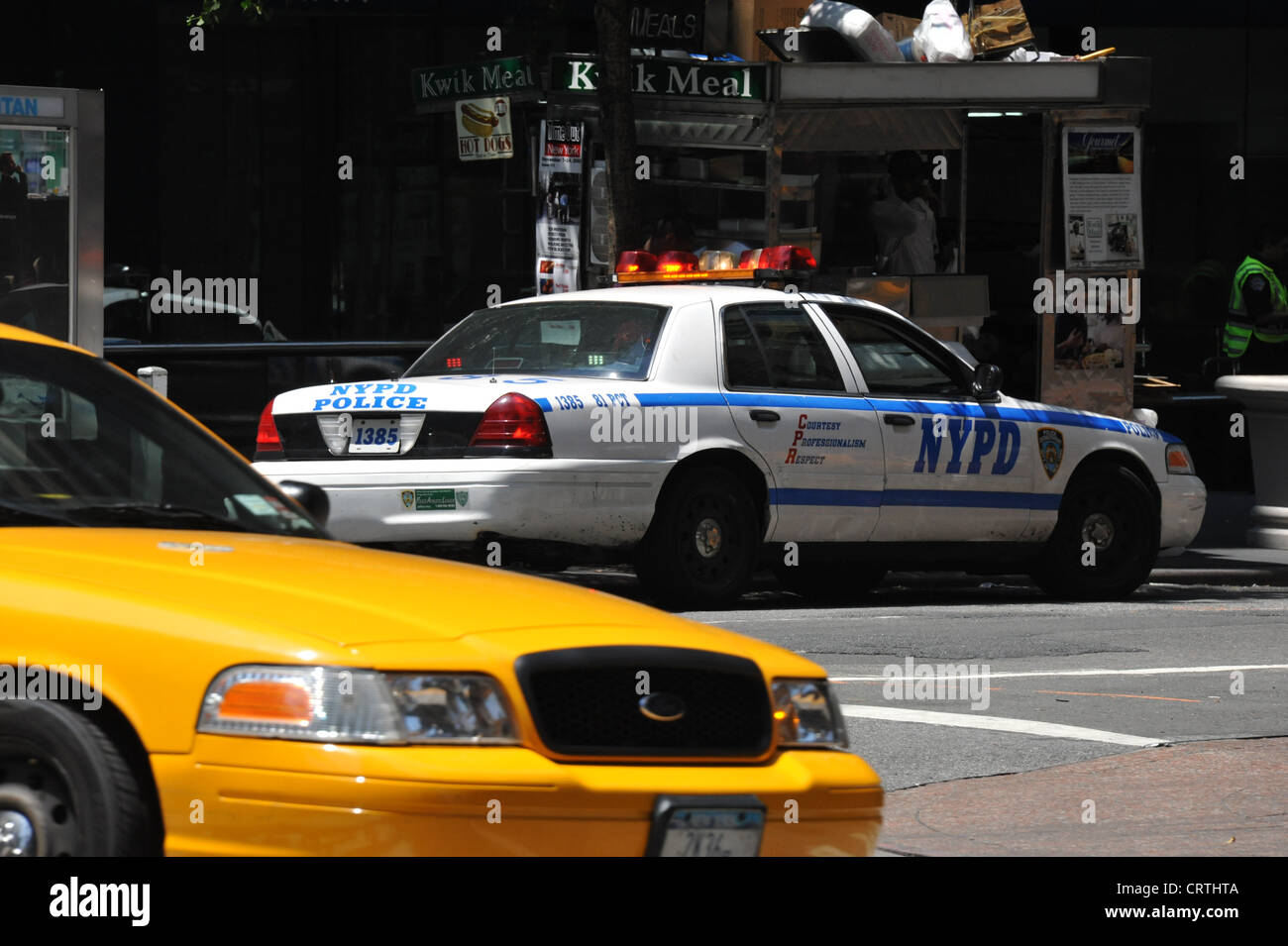 New York cab et New York police car Banque D'Images
