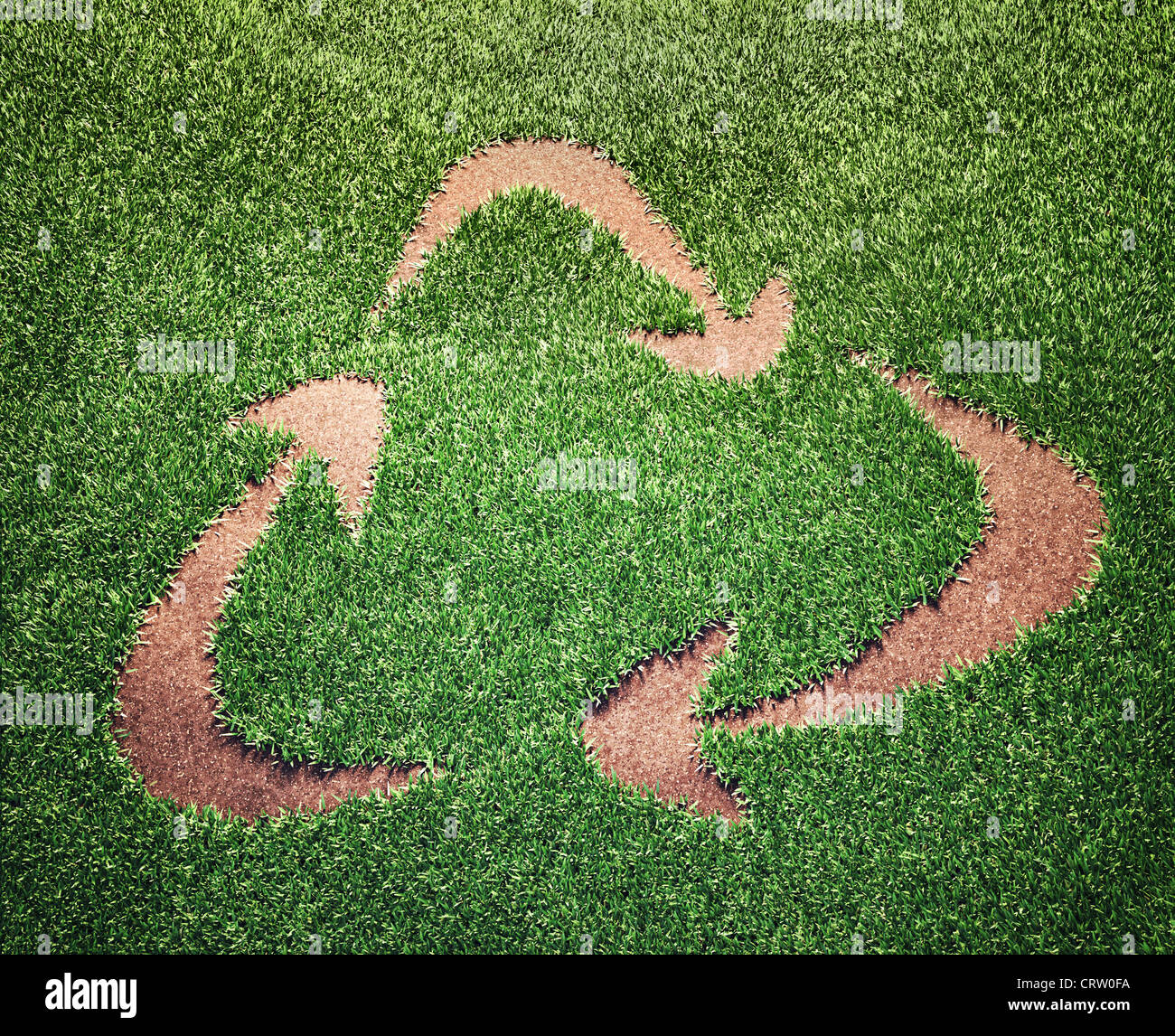 Symbole de recyclage dans un champ d'herbe Banque D'Images