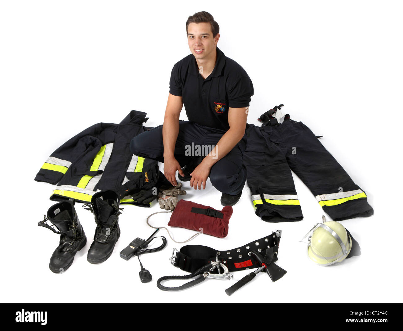 Les hommes du feu, de protection en fonction de l'épreuve, avec du matériel de lutte contre les incendies. Le feu, les sapeurs-pompiers. Banque D'Images