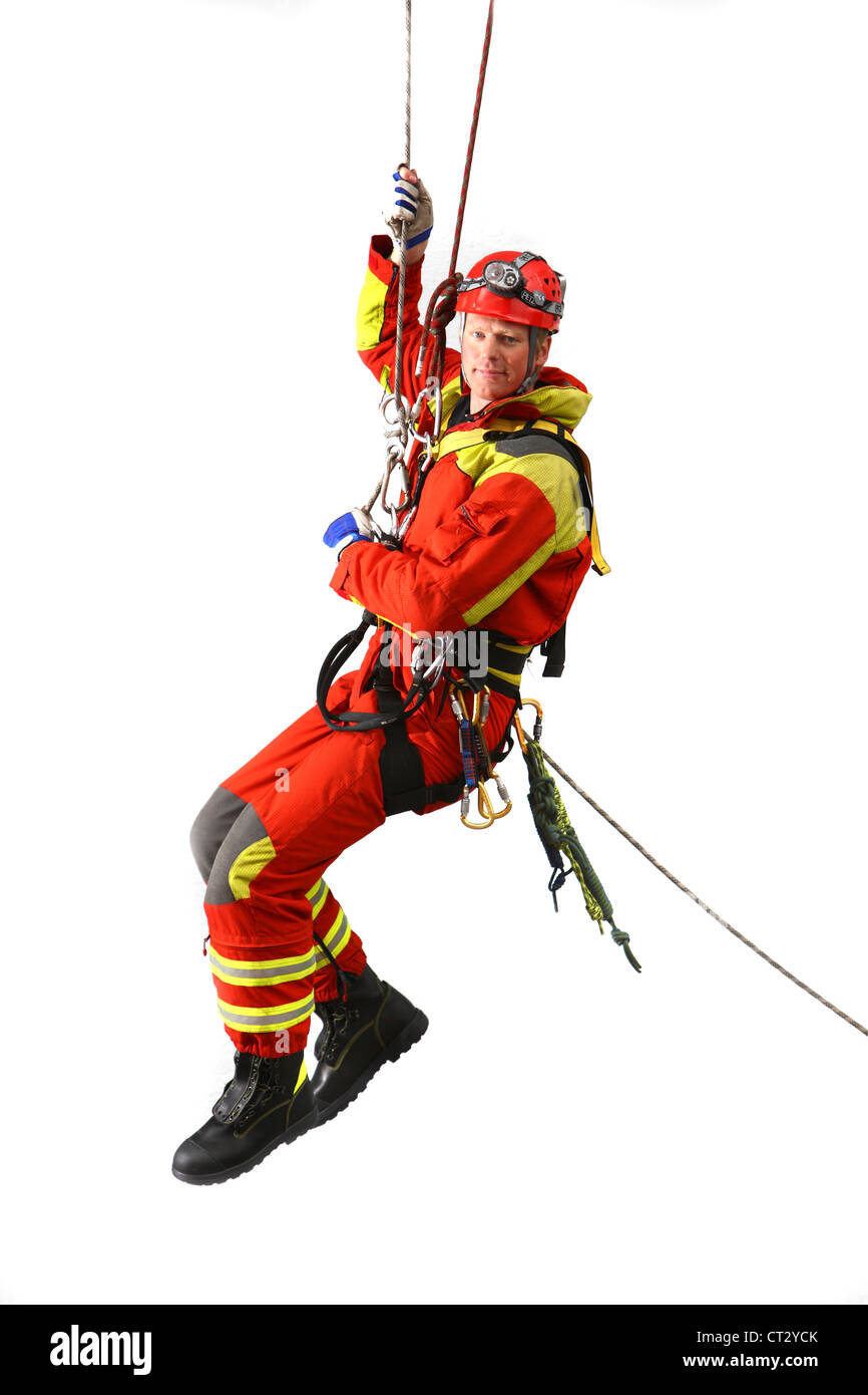 Les hommes d'incendie spécialiste pour sauver des gens de hauteurs et de trous profonds. Sauveur de la hauteur, l'incendie, les sapeurs-pompiers. Banque D'Images