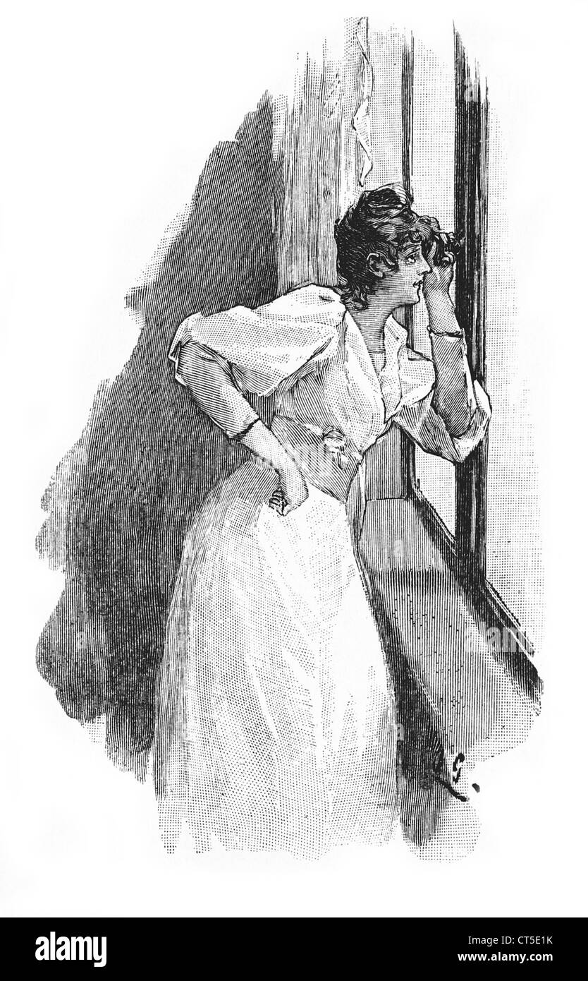 Jeune fille dans une chambre en regardant par la fenêtre Banque D'Images