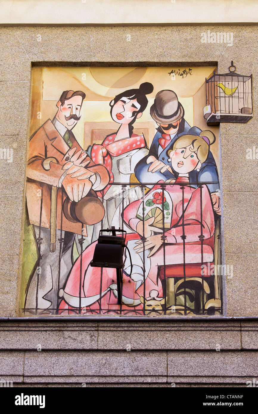 Peinture murale par Antonio Mingote sur une façade d'une maison dans la rue de la Sal, près de la Plaza Mayor à Madrid, Espagne. Banque D'Images