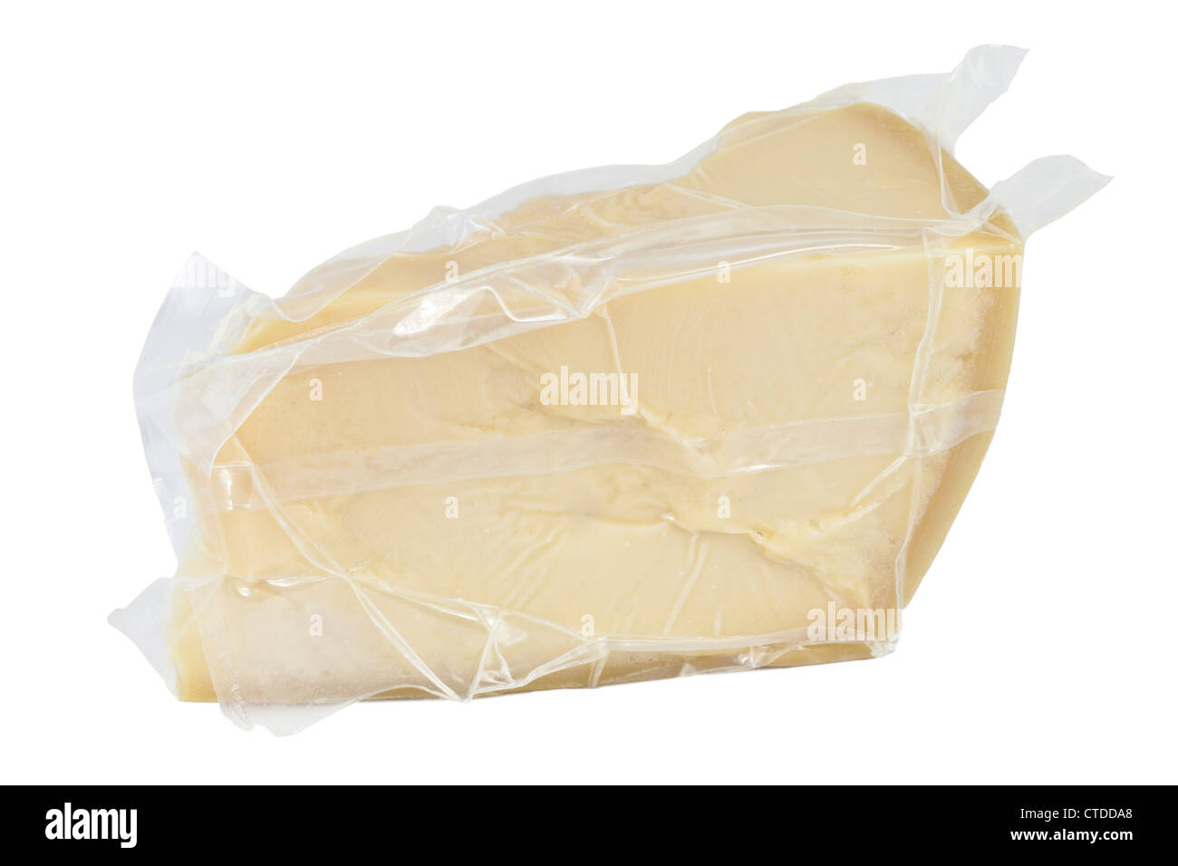 Un bloc emballés sous vide de fromage parmesan Banque D'Images