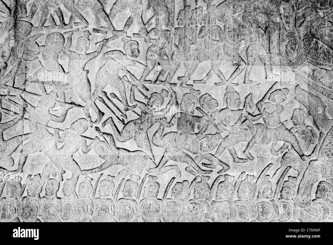Bas-relief d'une scène de bataille à Angkor Wat, au Cambodge Banque D'Images