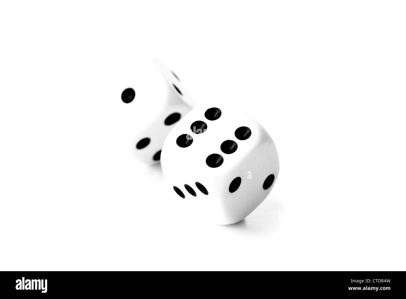 Black and white dices in motion Banque D'Images