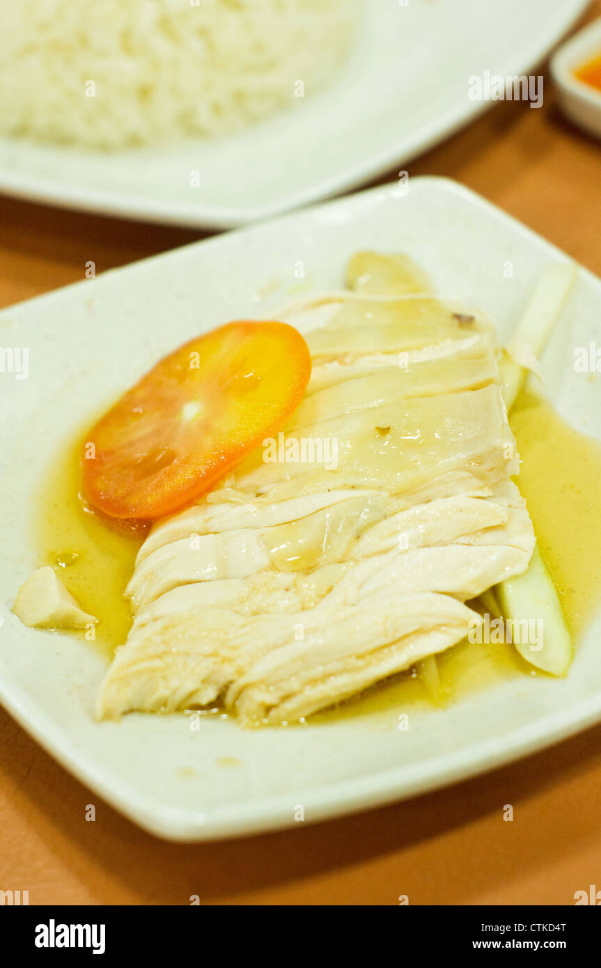 Riz au poulet hainanese de Singapour, un des plats les plus populaires. Banque D'Images