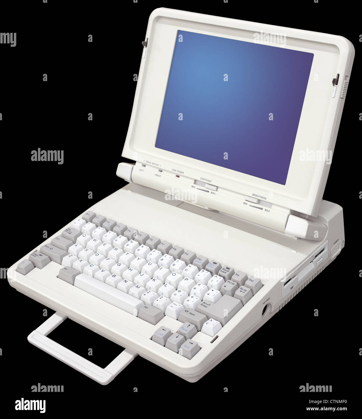Ancien ordinateur portable ordinateur isolé sur fond noir Photo Stock -  Alamy